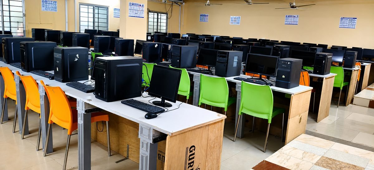 Computer laboratory at BSR Degree College with rows of desktop systems